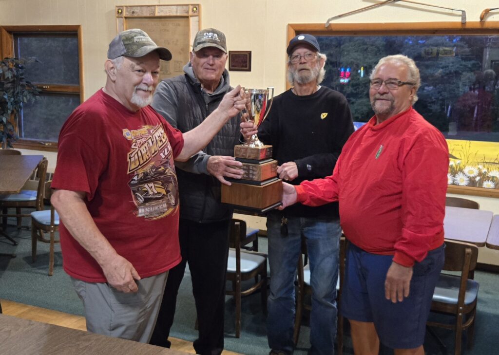 Friday Champs receive trophy