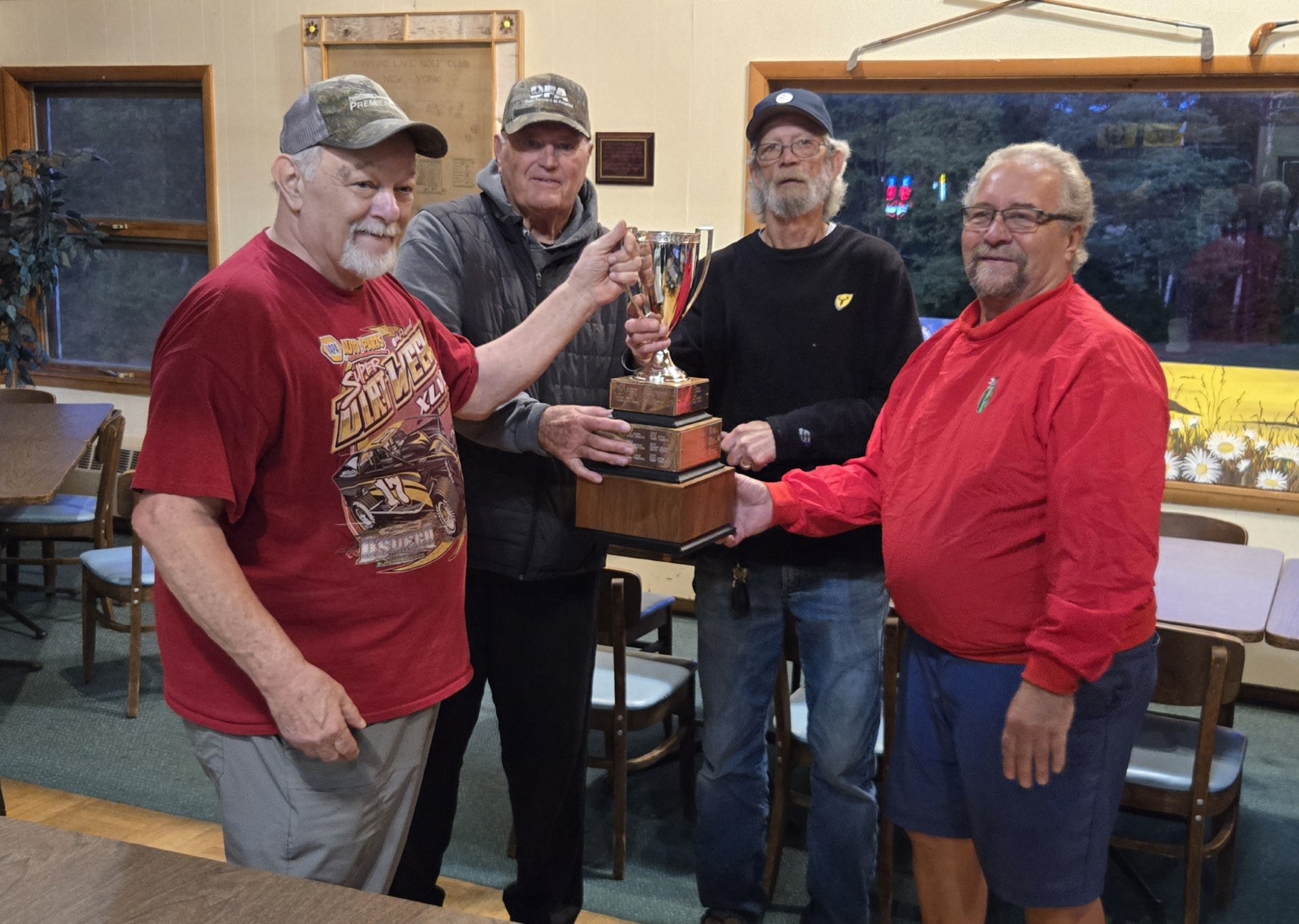 Friday Champs receive trophy